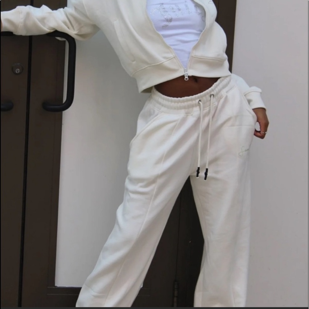 This gorgeous and unique jogger set includes pant and jacket.